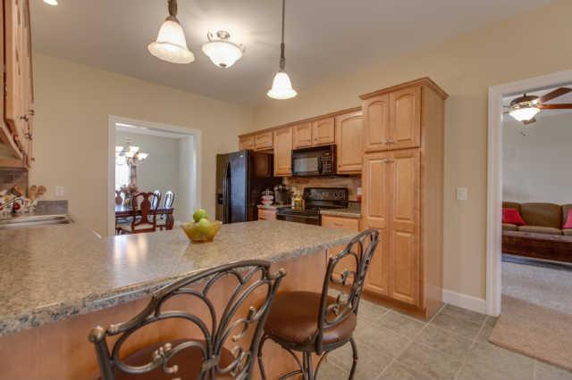 439 Conquest Road Murfreesboro, TN 37128 - Photo 5 of 20 This service bar is great for entertaining or great for kids to sit at and do their homework while you cook dinner.