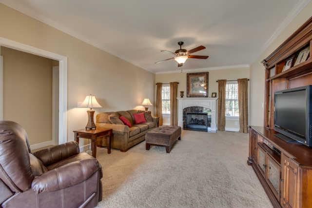 439 Conquest Road Murfreesboro, TN 37128 - Photo 7 of 20 This beautiful gas fireplace and logs are surrounded by marble and has a remote control starter and flame adjustment. You can turn on the fireplace without getting up from the couch. Living room has cable outlets on both full walls. The foyer/entry h