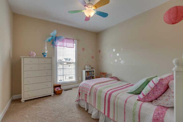 439 Conquest Road Murfreesboro, TN 37128 - Photo 10 of 20 Bedroom 2 is on the main level and has a ceiling fan.