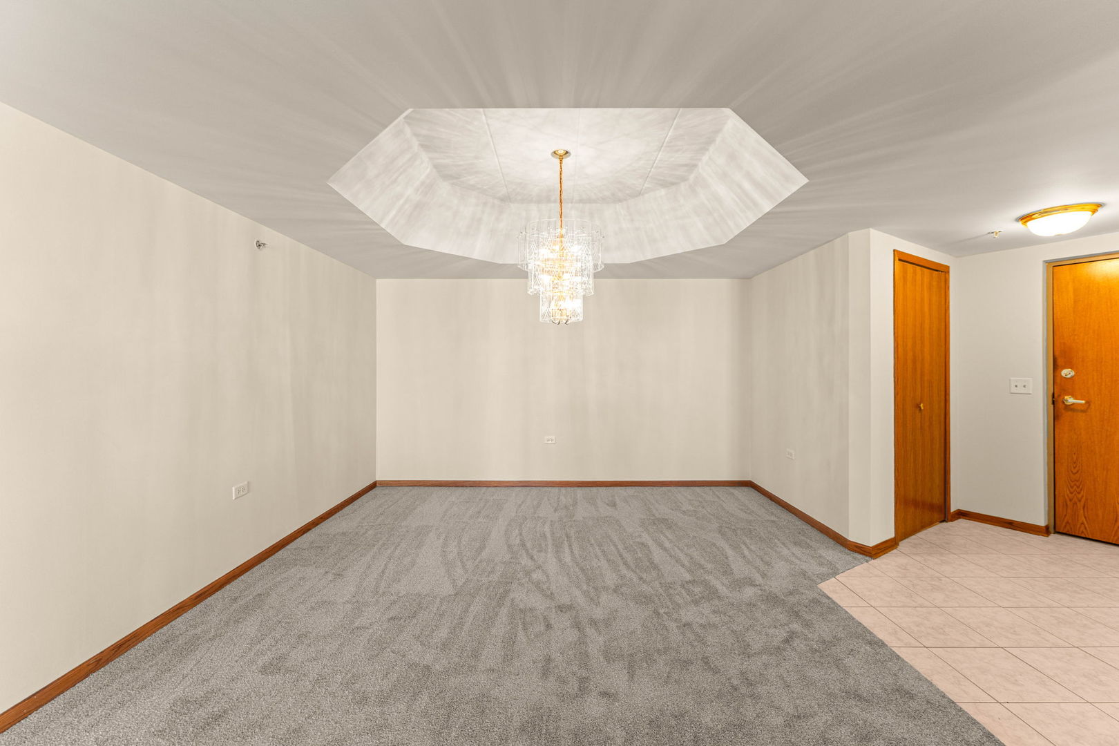 11901 Windemere Court, Unit 301 Orland Park, IL 60467 - Photo 19 of 27 wooden floor in an empty room with a window