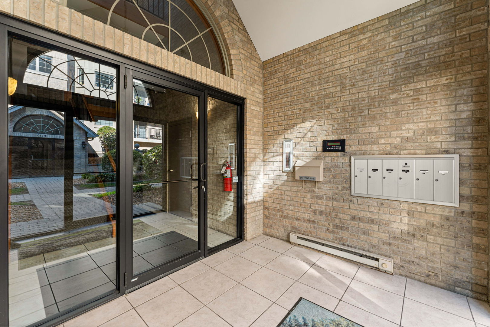 11901 Windemere Court, Unit 301 Orland Park, IL 60467 - Photo 2 of 27 a view of a entryway