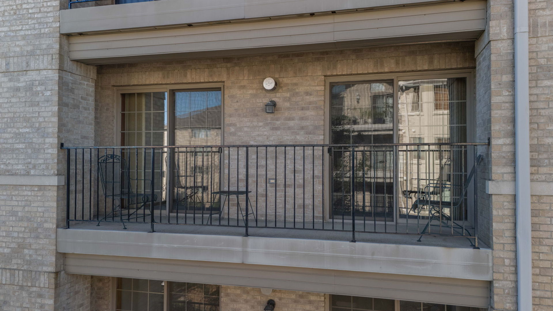 11901 Windemere Court, Unit 301 Orland Park, IL 60467 - Photo 26 of 27 a view of a house with a glass door