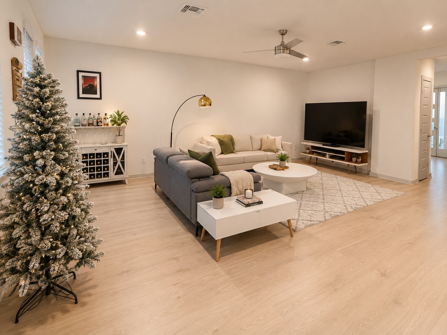 10924 Meris Lane Austin, TX 78754 - Photo 1 of 20 Open-concept living space featuring light wood-finish flooring, recessed lighting, and a ceiling fan