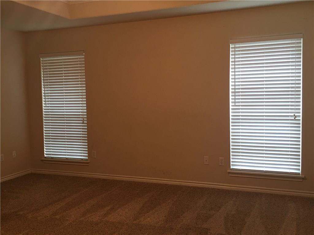 2218 Old Ironsides Road Abilene, TX 79601 - Photo 18 of 26 a view of an empty room with a window
