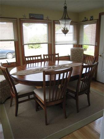 50 Grapevine Road Gloucester, MA 01930 - Photo 4 of 9 a view of a dining room with furniture window and outside view