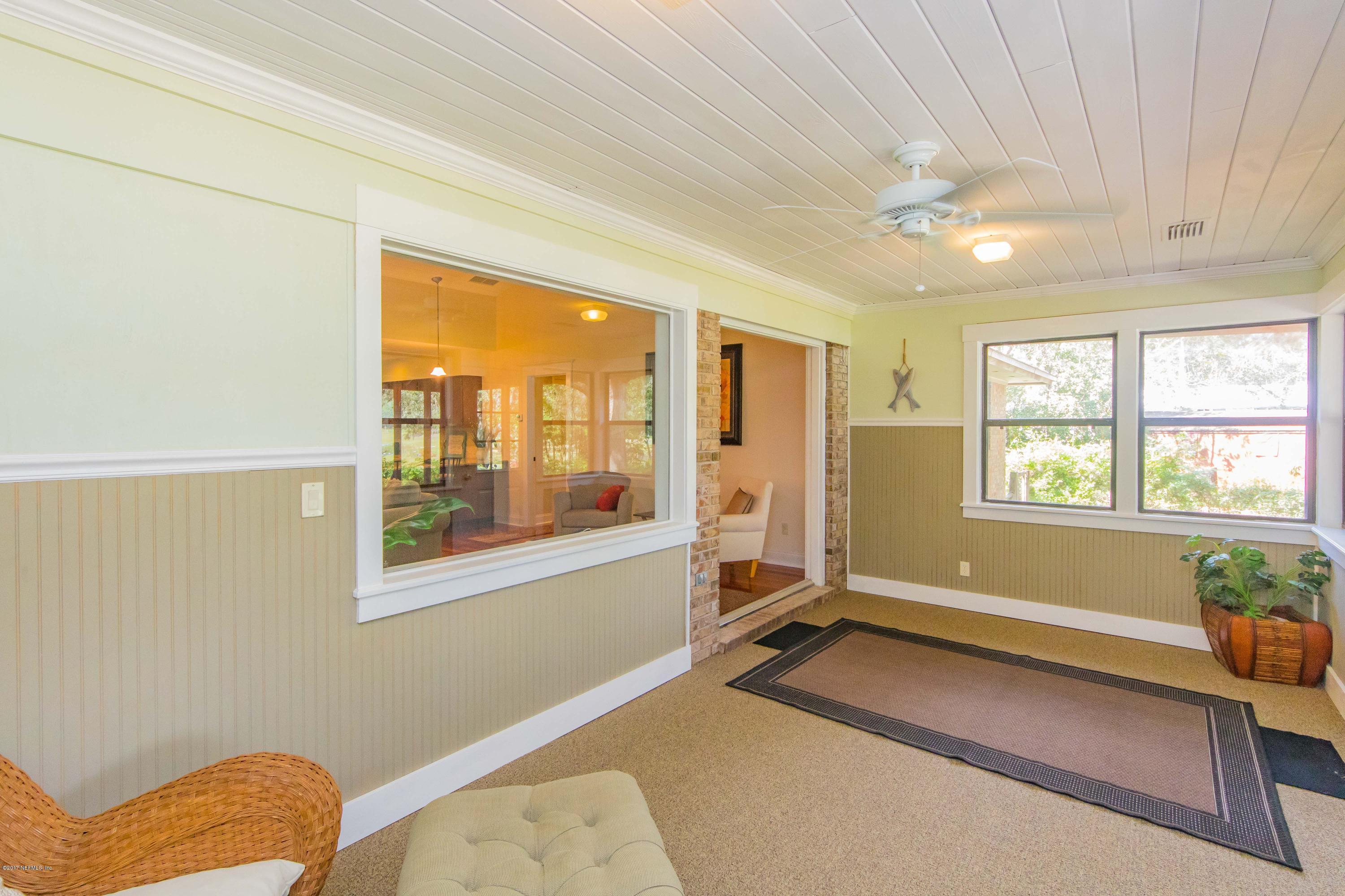 6255 Little Lake Geneva Road Keystone Heights, FL 32656 - Photo 23 of 59 a view of a livingroom with a window