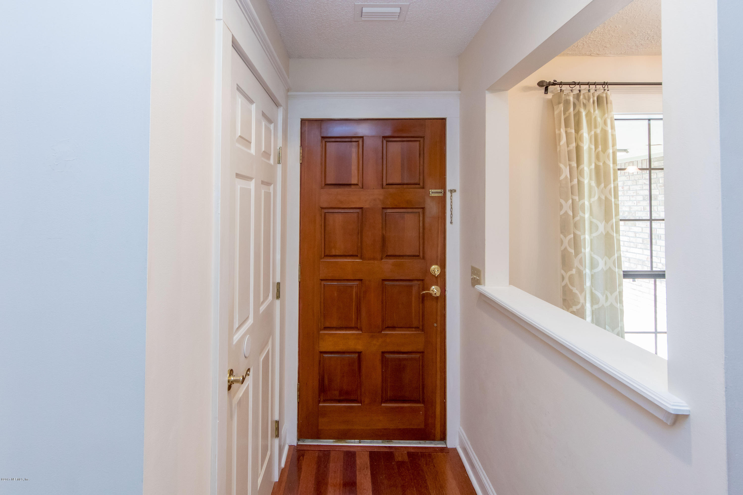 6255 Little Lake Geneva Road Keystone Heights, FL 32656 - Photo 8 of 59 a view of front door with hallway