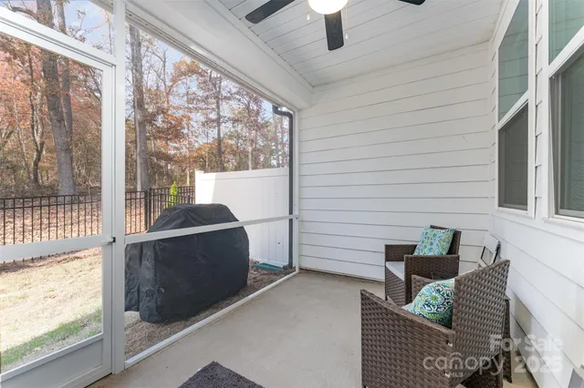 a view of a porch with furniture