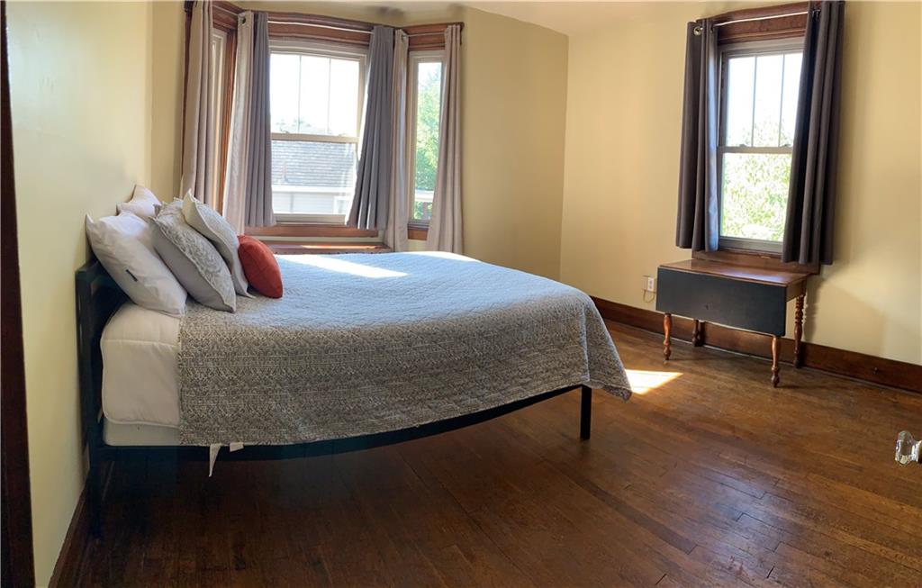 2619 Brighton Road Pittsburgh, PA 15212 - Photo 16 of 23 Master Bedroom 12x12 plus bay window. There is a door from this room to the adjoining smaller bedroom that could also be used for a dressing room, office or nursery.