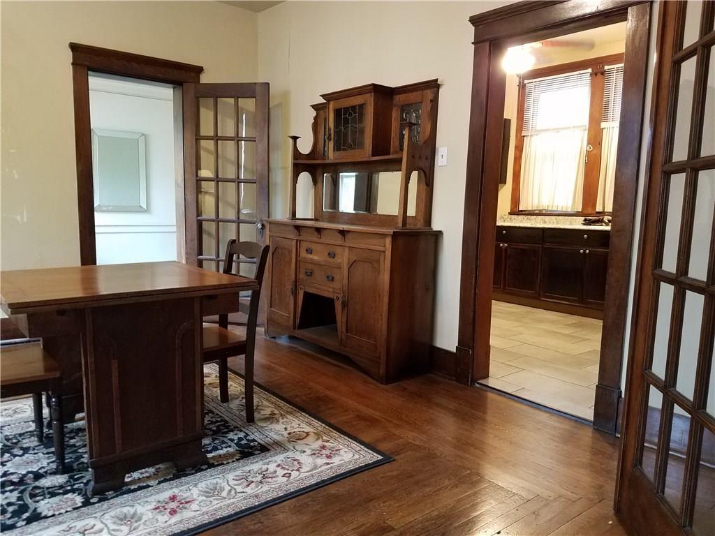 2619 Brighton Road Pittsburgh, PA 15212 - Photo 7 of 23 Dining Room with hardwood floor looking into Kitchen and Den