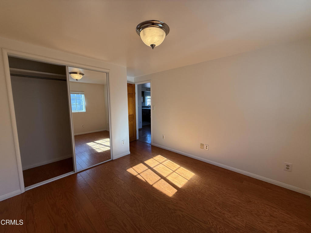 1775 Atchison Street Pasadena, CA 91104 - Photo 12 of 18 a view of empty room with wooden floor