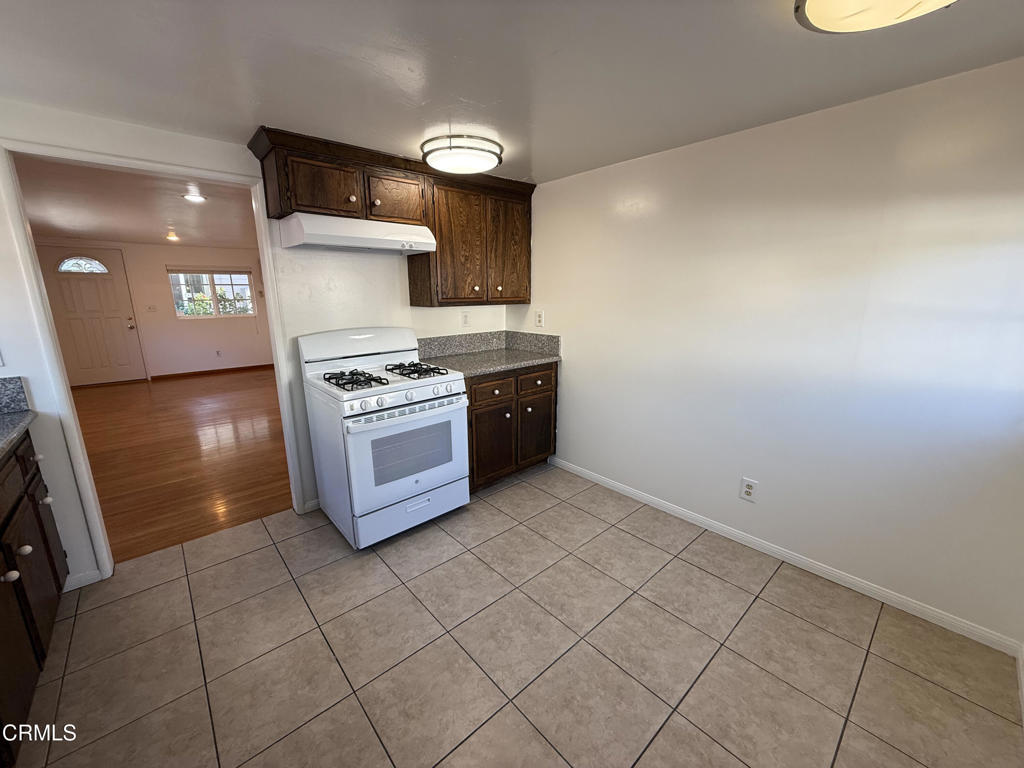 1775 Atchison Street Pasadena, CA 91104 - Photo 6 of 18 a kitchen with a stove