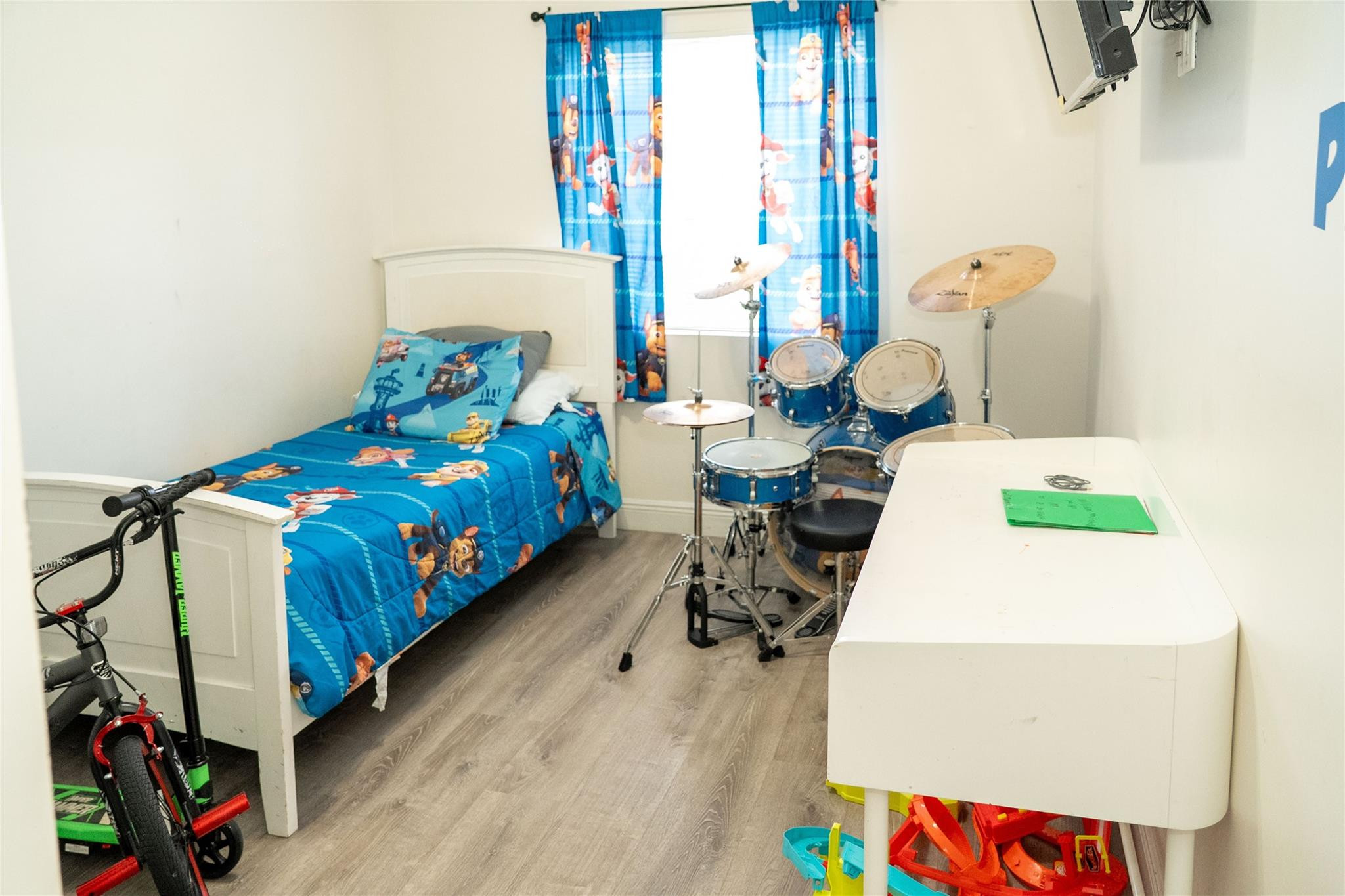 2710 Northwest 5th Street Pompano Beach, FL 33069 - Photo 17 of 31 a bedroom with bed and a window