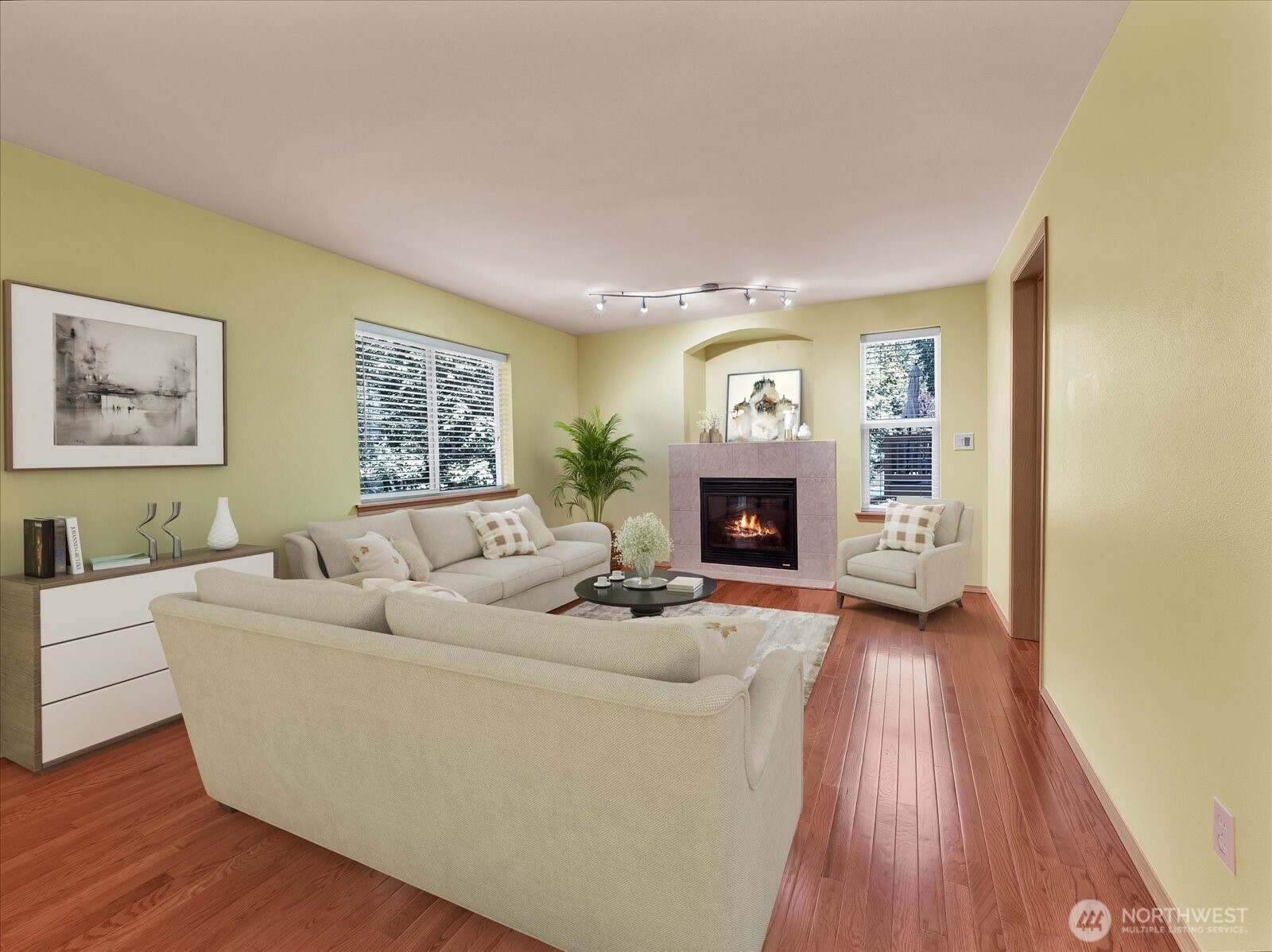 14740 Southeast 187 Court Renton, WA 98058 - Photo 13 of 38 a living room with furniture and a fireplace