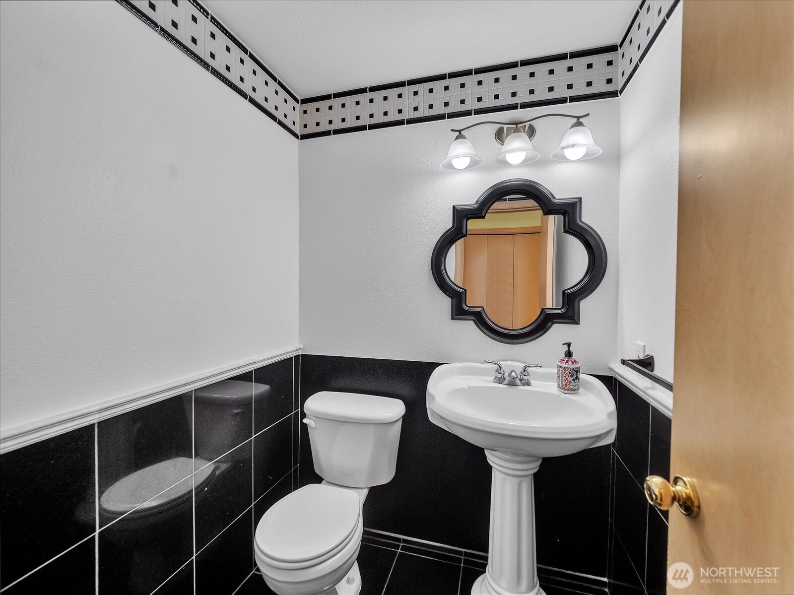 14740 Southeast 187 Court Renton, WA 98058 - Photo 8 of 38 a bathroom with a toilet sink and mirror