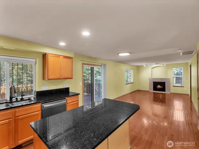 a kitchen with sink and window