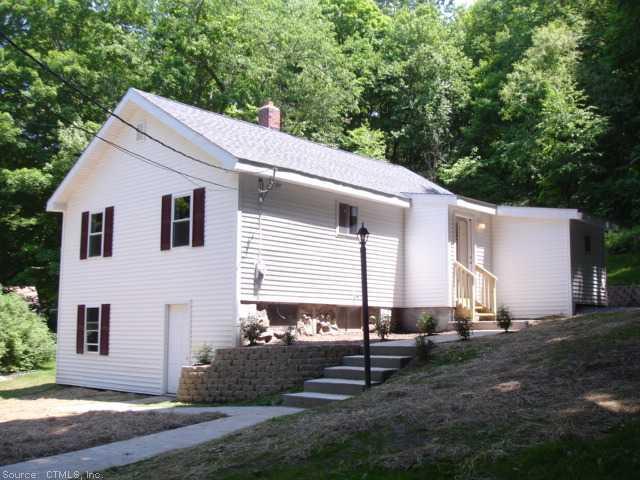938 Amity Road Bethany, CT 06524 - Photo 1 of 1 a house view with a backyard space
