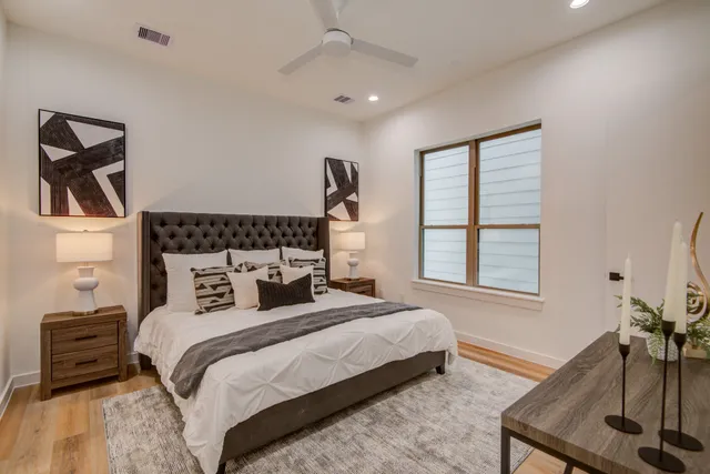 a view of closet with wooden floor