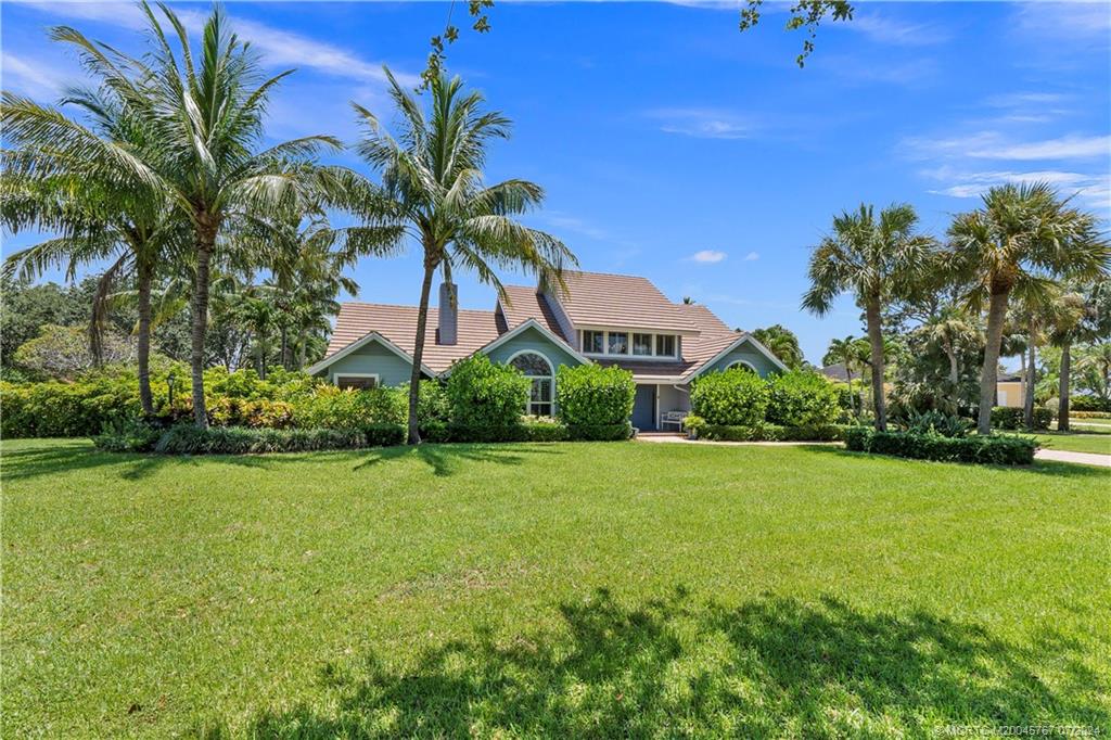 18770 Southeast River Ridge Road Jupiter, FL 33469 - Photo 1 of 81 a view of a garden