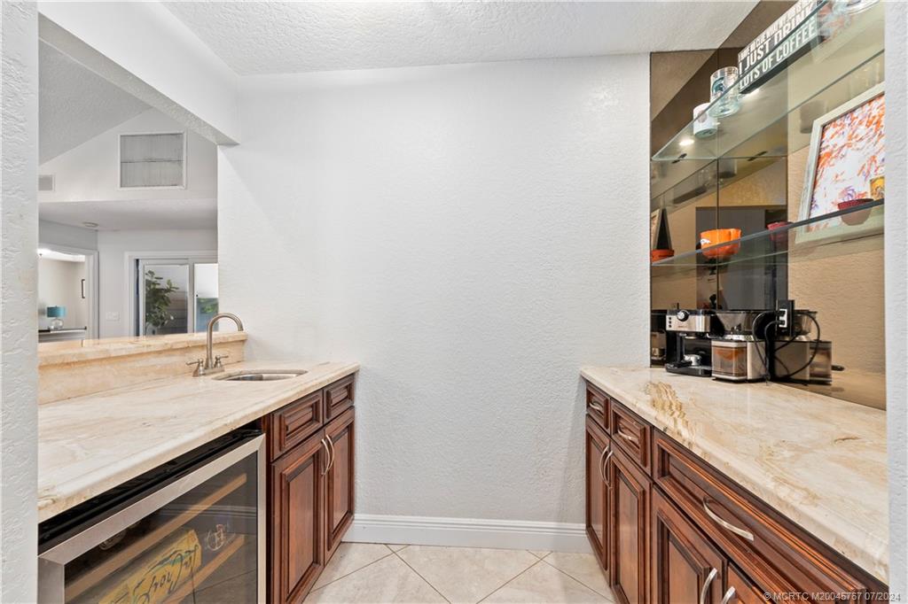 18770 Southeast River Ridge Road Jupiter, FL 33469 - Photo 19 of 81 a bathroom with a sink and a mirror