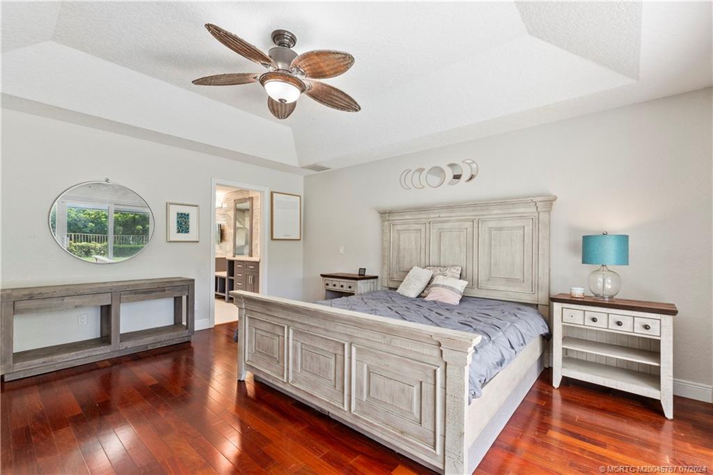 18770 Southeast River Ridge Road Jupiter, FL 33469 - Photo 30 of 81 a bed room with a bed and a window