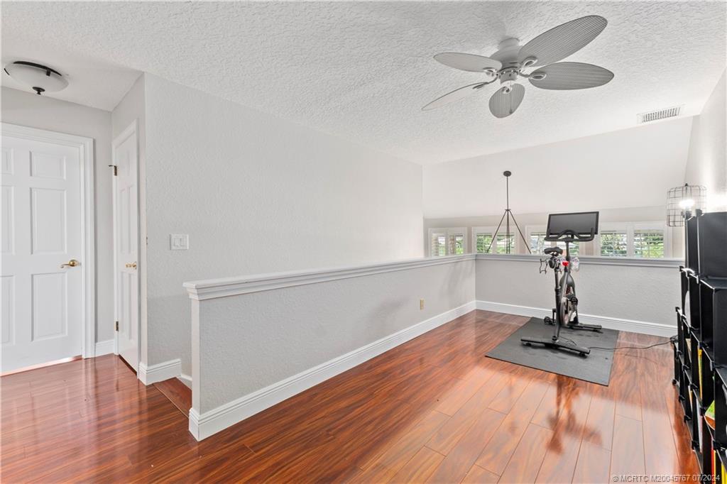 18770 Southeast River Ridge Road Jupiter, FL 33469 - Photo 40 of 81 a view of a room with gym equipment