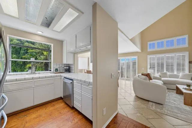 a kitchen with a stove and a sink
