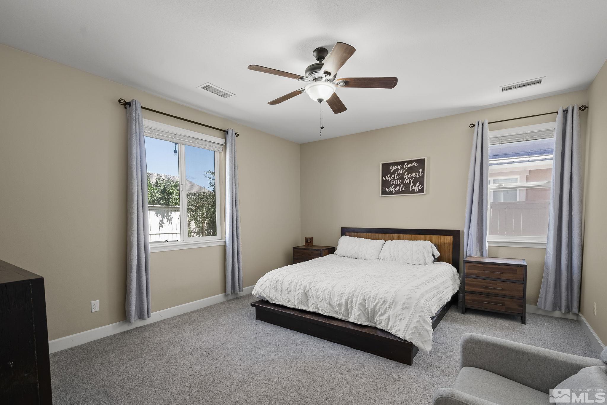 2135 Blue Oaks Drive Reno, NV 89521 - Photo 11 of 23 a bedroom with a bed and a window