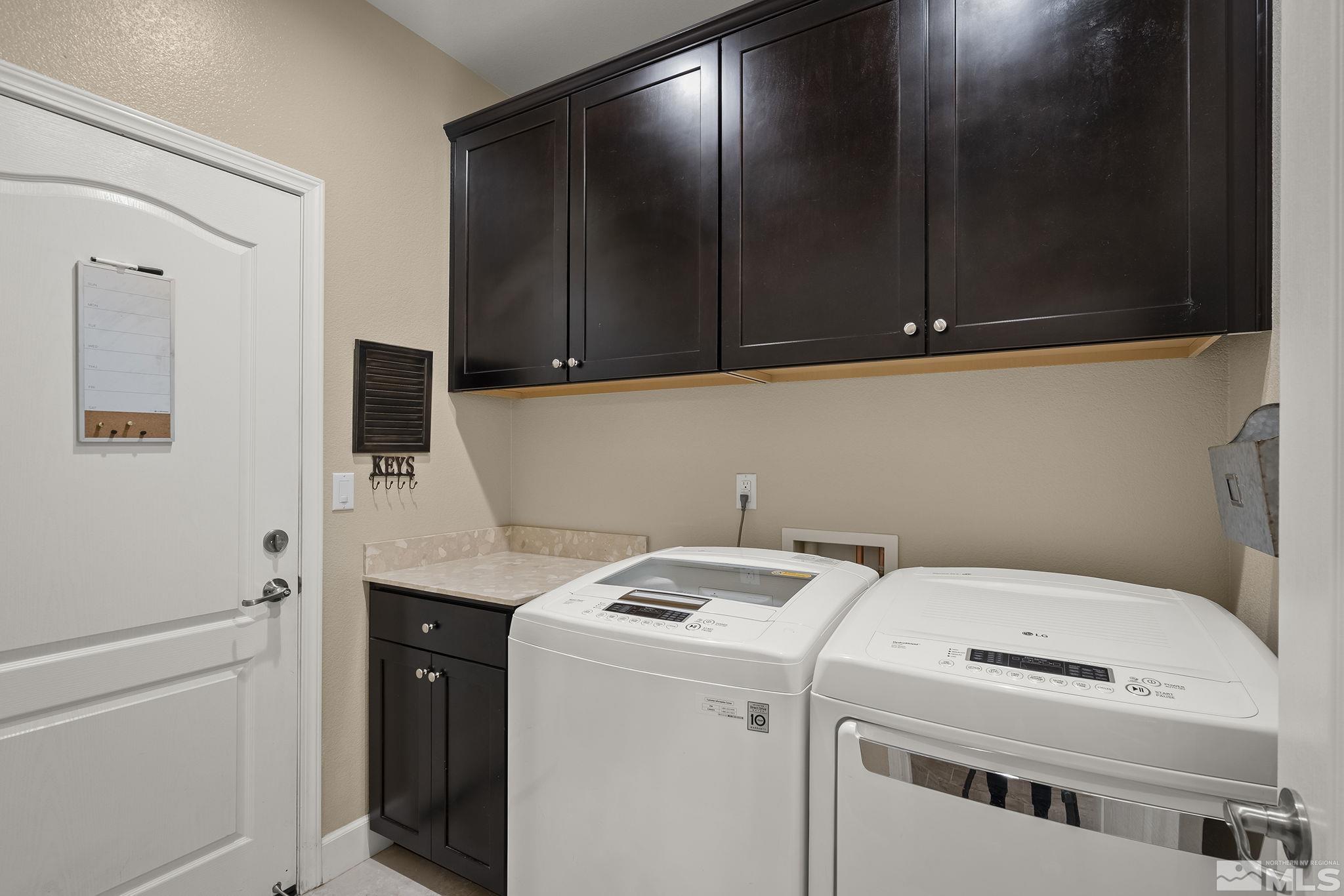 2135 Blue Oaks Drive Reno, NV 89521 - Photo 18 of 23 a utility room with dryer and washer