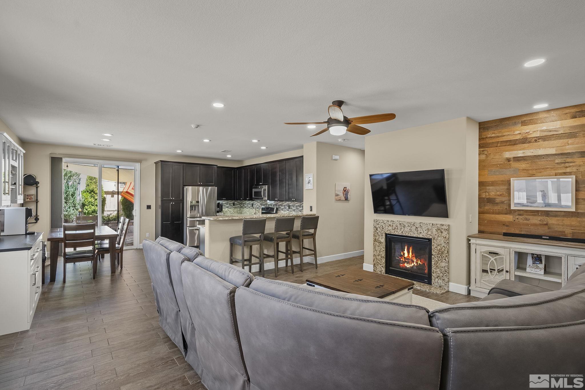 2135 Blue Oaks Drive Reno, NV 89521 - Photo 3 of 23 a living room with furniture and a fireplace