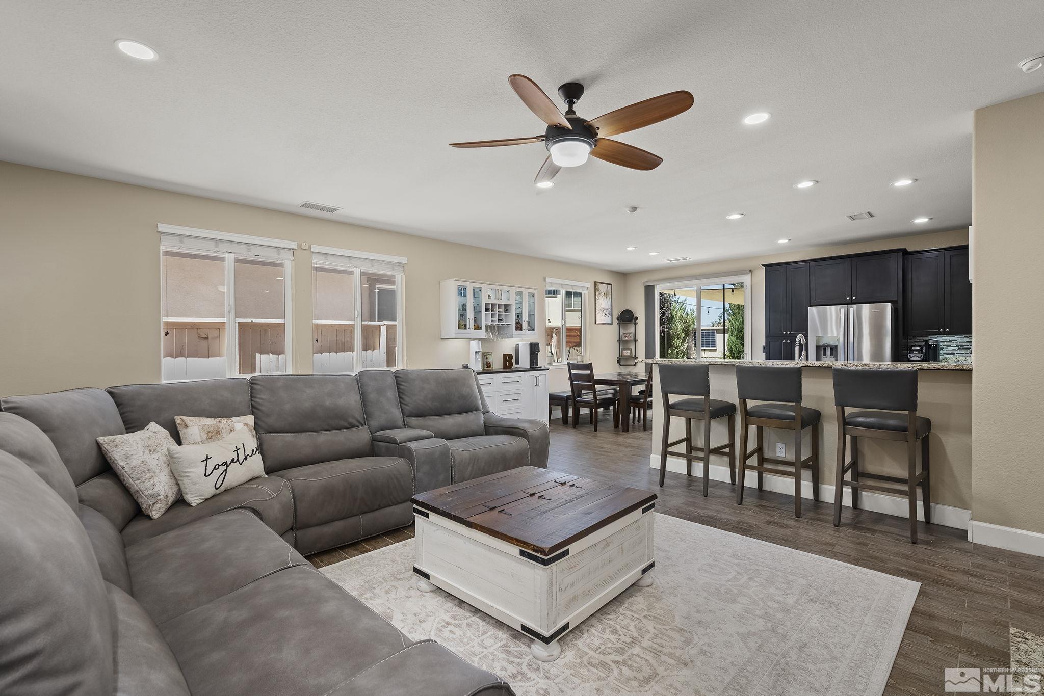 2135 Blue Oaks Drive Reno, NV 89521 - Photo 6 of 23 a living room with furniture and a view of kitchen