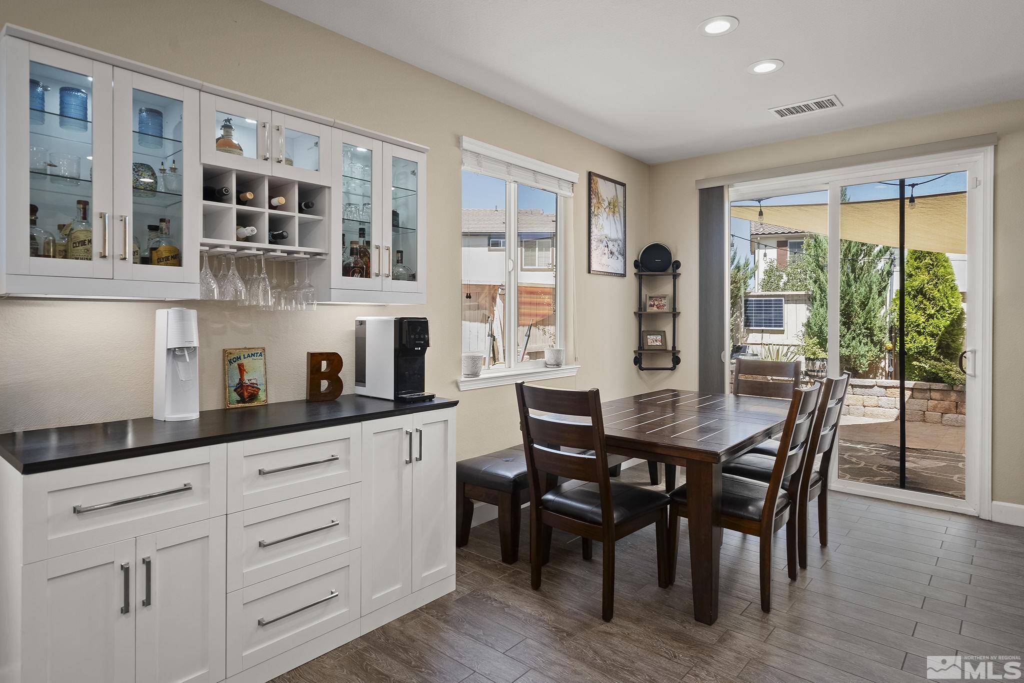 2135 Blue Oaks Drive Reno, NV 89521 - Photo 7 of 23 a view of a dining room with furniture window and wooden floor