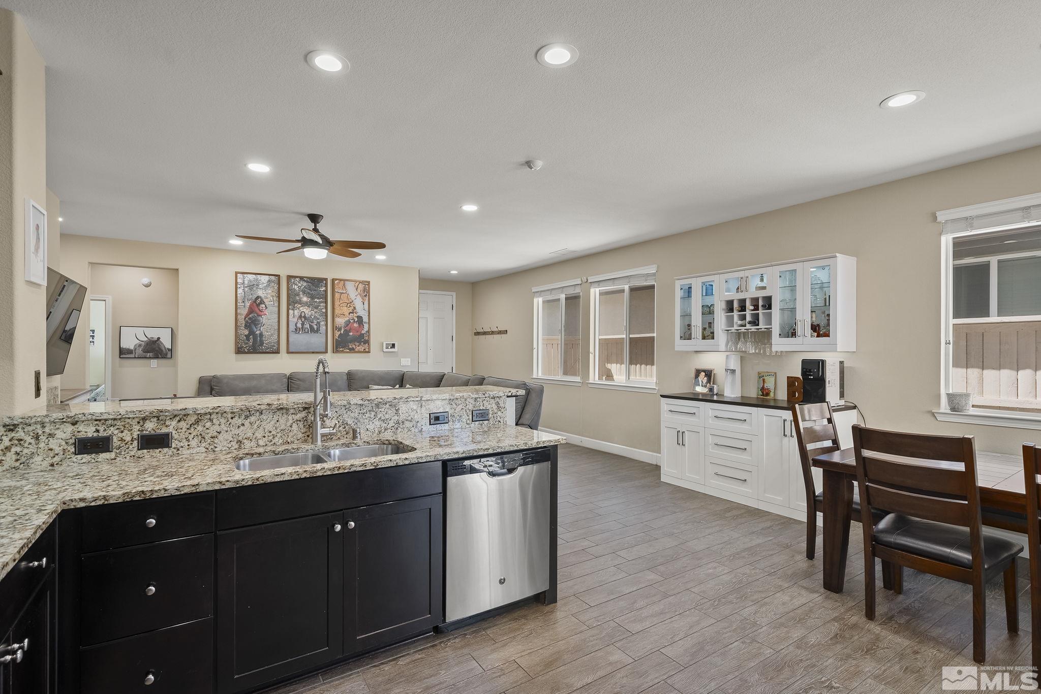 2135 Blue Oaks Drive Reno, NV 89521 - Photo 8 of 23 a large kitchen with kitchen island a large island in the center