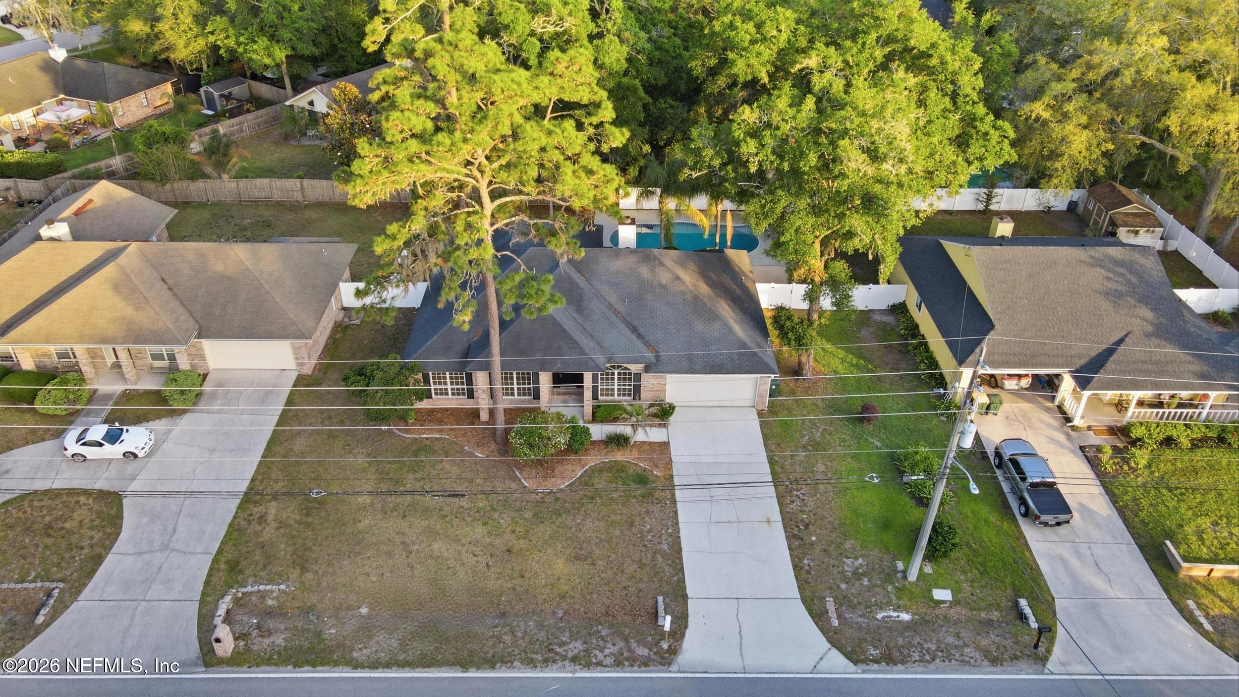 3286 Marbon Road Jacksonville, FL 32223 - Photo 35 of 36 an aerial view of a house with a yard