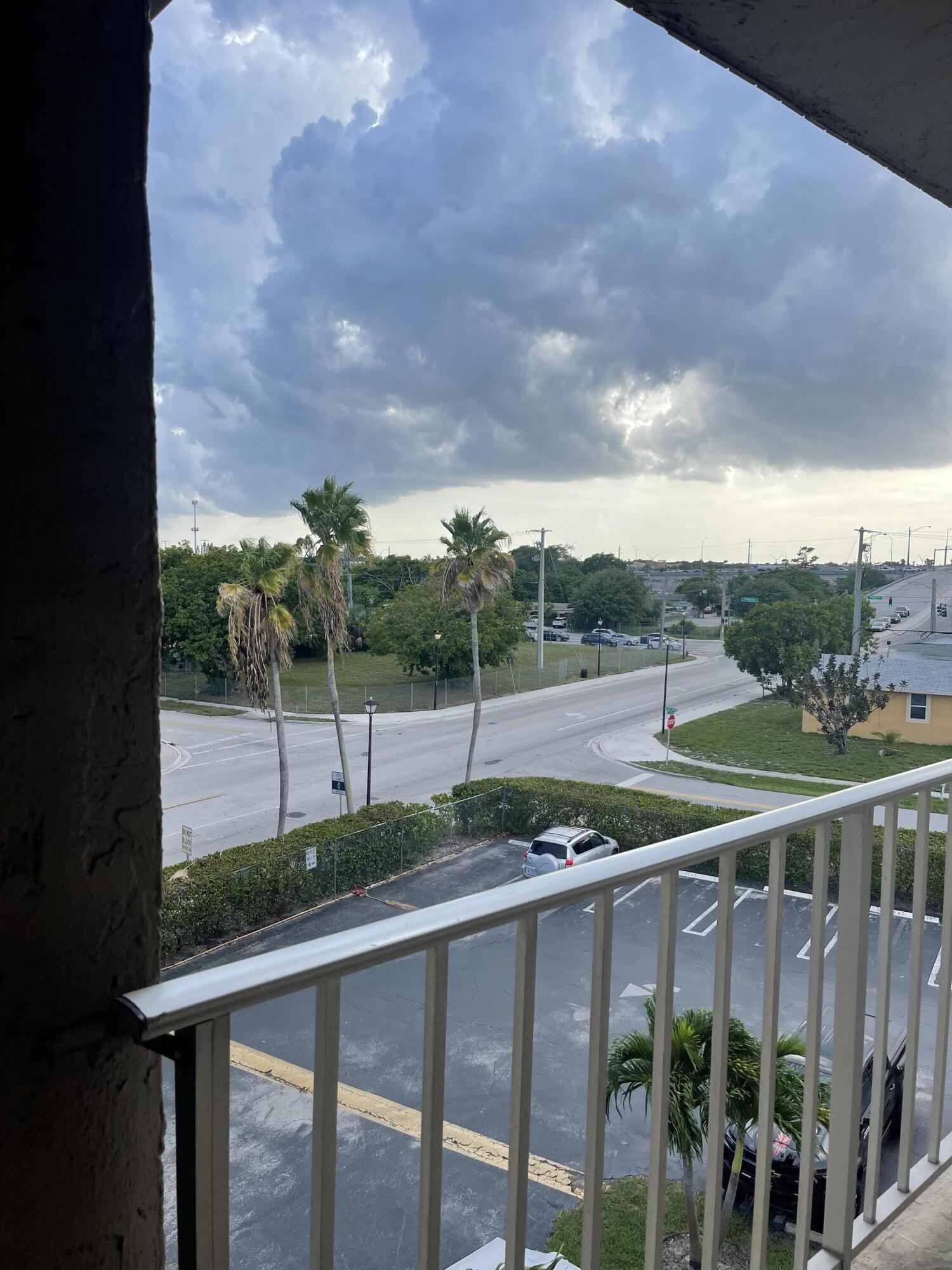 2300 Northeast 1st Lane, Unit 4020 Boynton Beach, FL 33435 - Photo 2 of 20 a view of a deck with a big yard