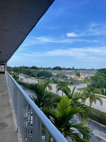 a view of a balcony with lake view