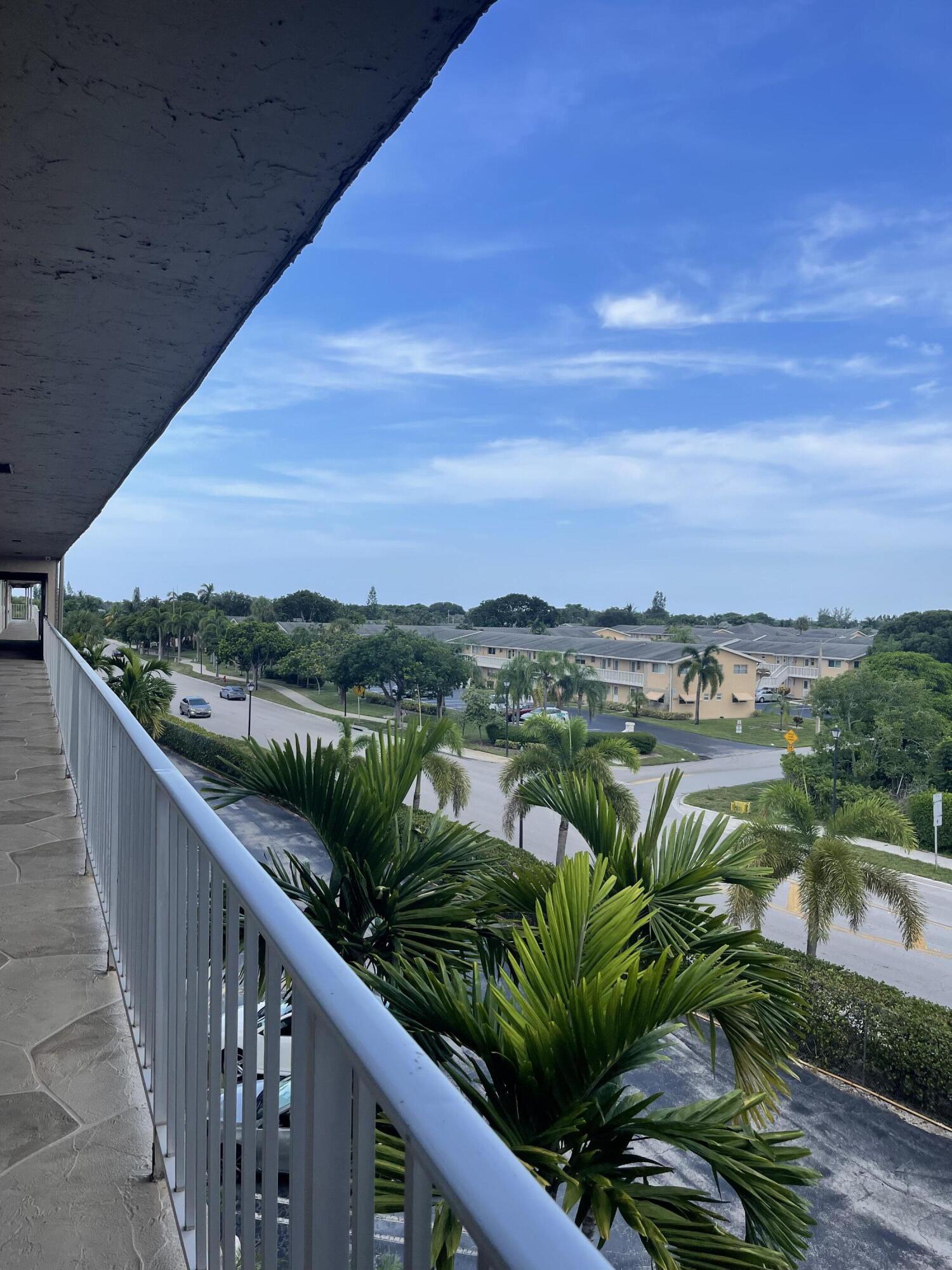 2300 Northeast 1st Lane, Unit 4020 Boynton Beach, FL 33435 - Photo 3 of 20 a view of a balcony with lake view