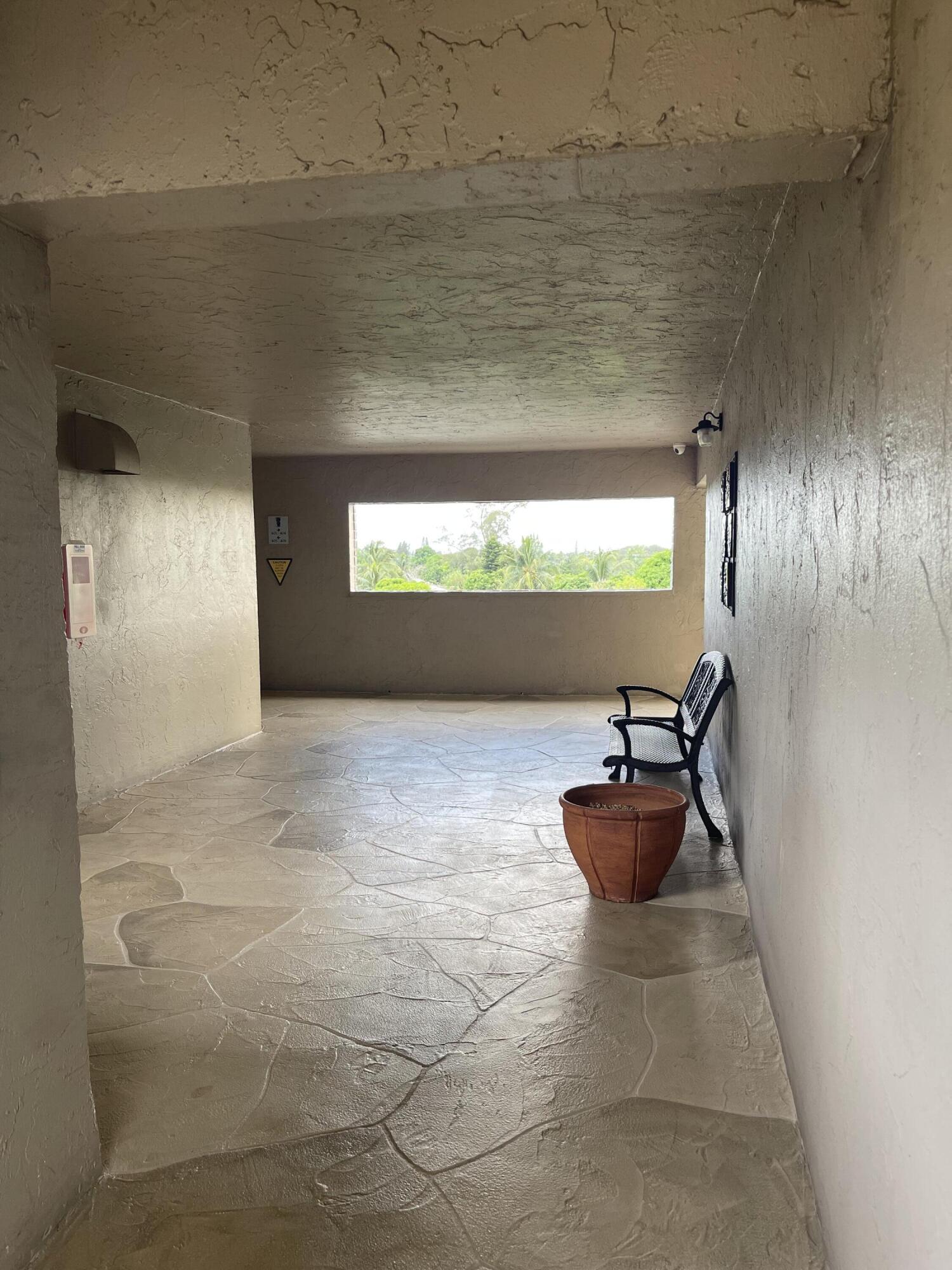 2300 Northeast 1st Lane, Unit 4020 Boynton Beach, FL 33435 - Photo 5 of 20 a view of an empty room with a window