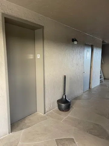 a view of a livingroom with a bench