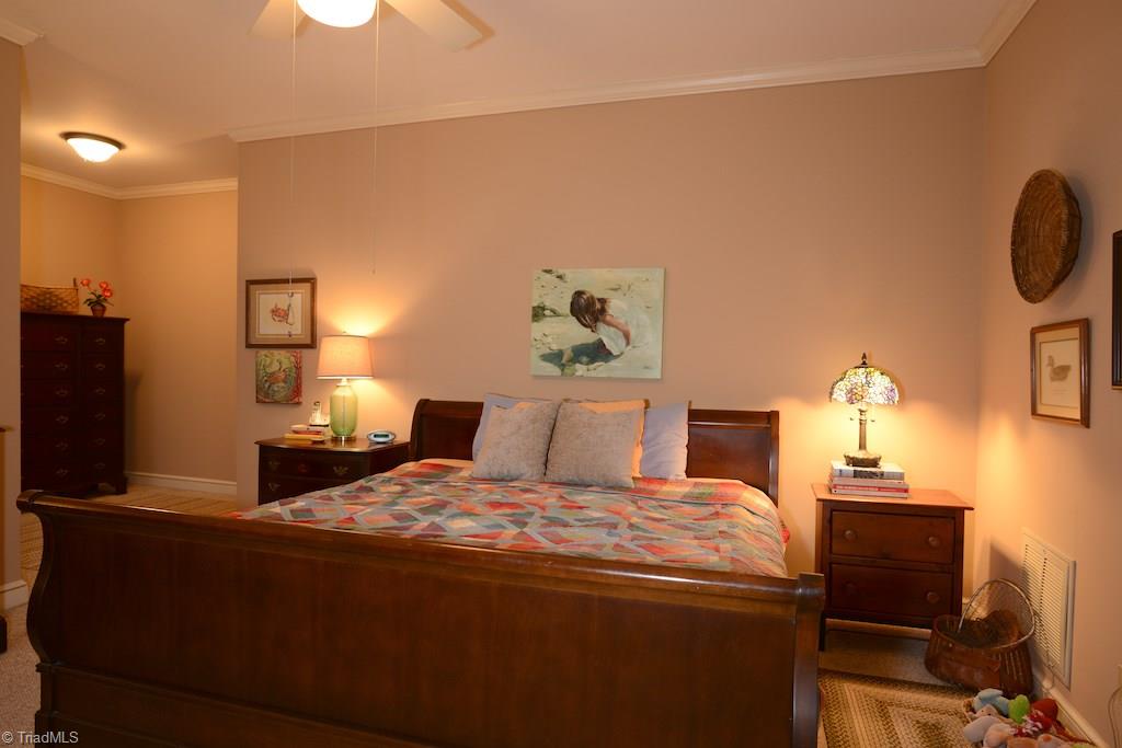 407 Walnut Grove Road Archdale, NC 27263 - Photo 14 of 30 Large master suite on the main level.