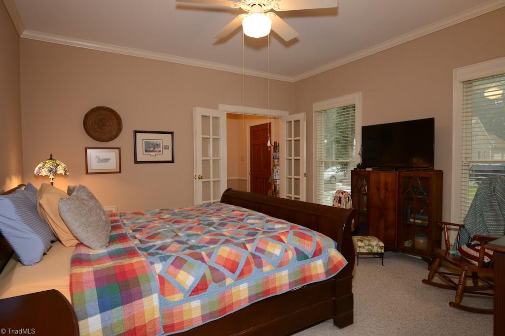 407 Walnut Grove Road Archdale, NC 27263 - Photo 16 of 30 Master bedroom is nice and bright with its big windows.