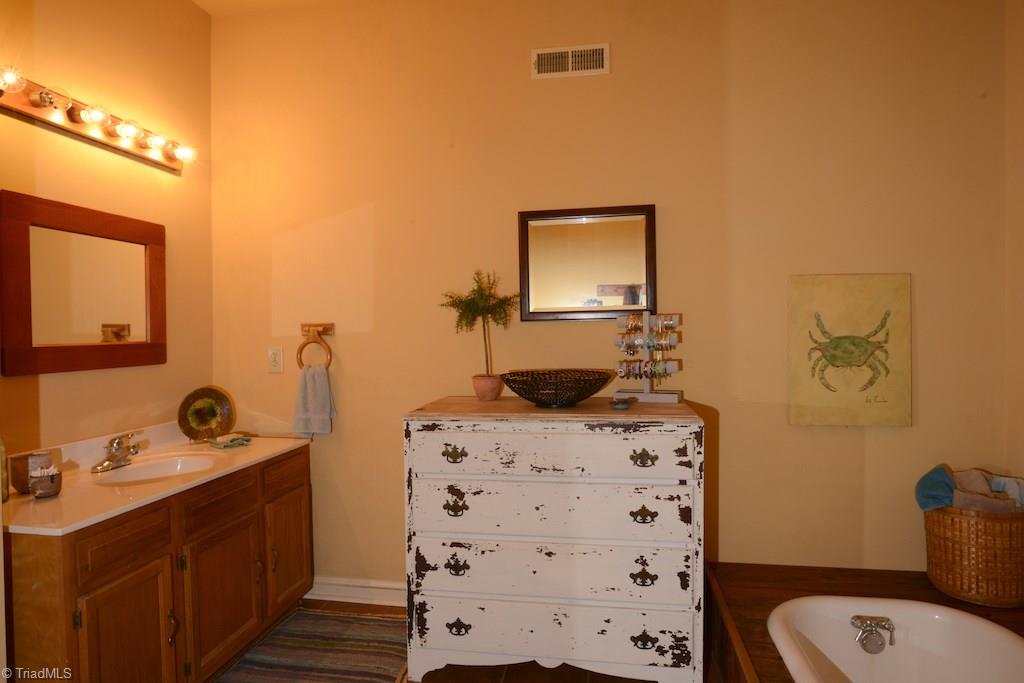 407 Walnut Grove Road Archdale, NC 27263 - Photo 18 of 30 Master bath with built in tub.