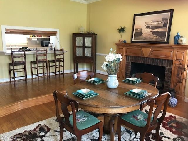 407 Walnut Grove Road Archdale, NC 27263 - Photo 4 of 30 Living area can also be easily used as a formal dining area as shown here.