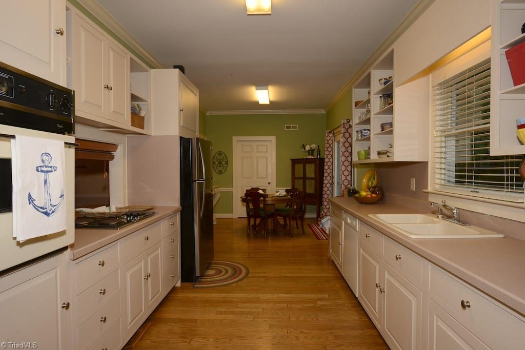 407 Walnut Grove Road Archdale, NC 27263 - Photo 7 of 30 View of kitchen with eating area.