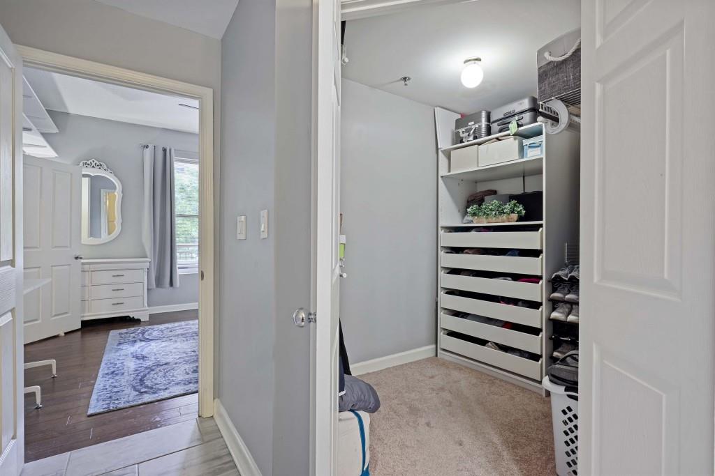 1101 Juniper Street Northeast, Unit 219 Atlanta, GA 30309 - Photo 15 of 31 a view of entryway with livingroom and wooden floor
