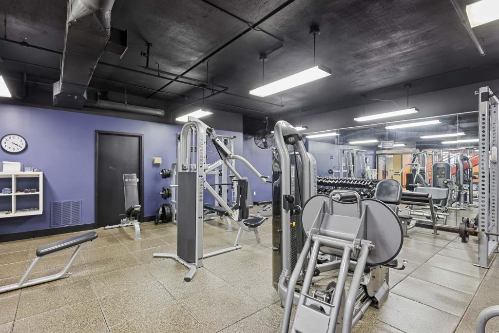 1101 Juniper Street Northeast, Unit 219 Atlanta, GA 30309 - Photo 25 of 31 a view of a room with gym equipment