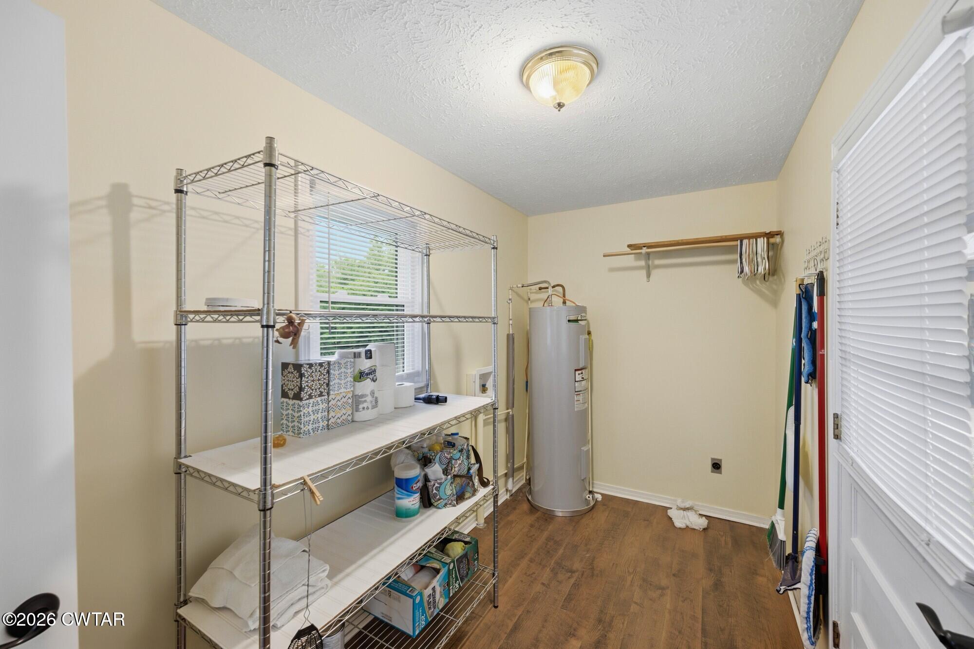 944 Brooksie Thompson Road Decaturville, TN 38329 - Photo 16 of 47 a very nice looking room with a large window
