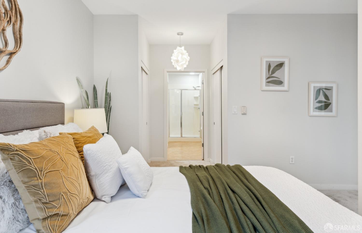 288 3rd Street, Unit 201 Oakland, CA 94607 - Photo 14 of 51 a bedroom with a bed and a window