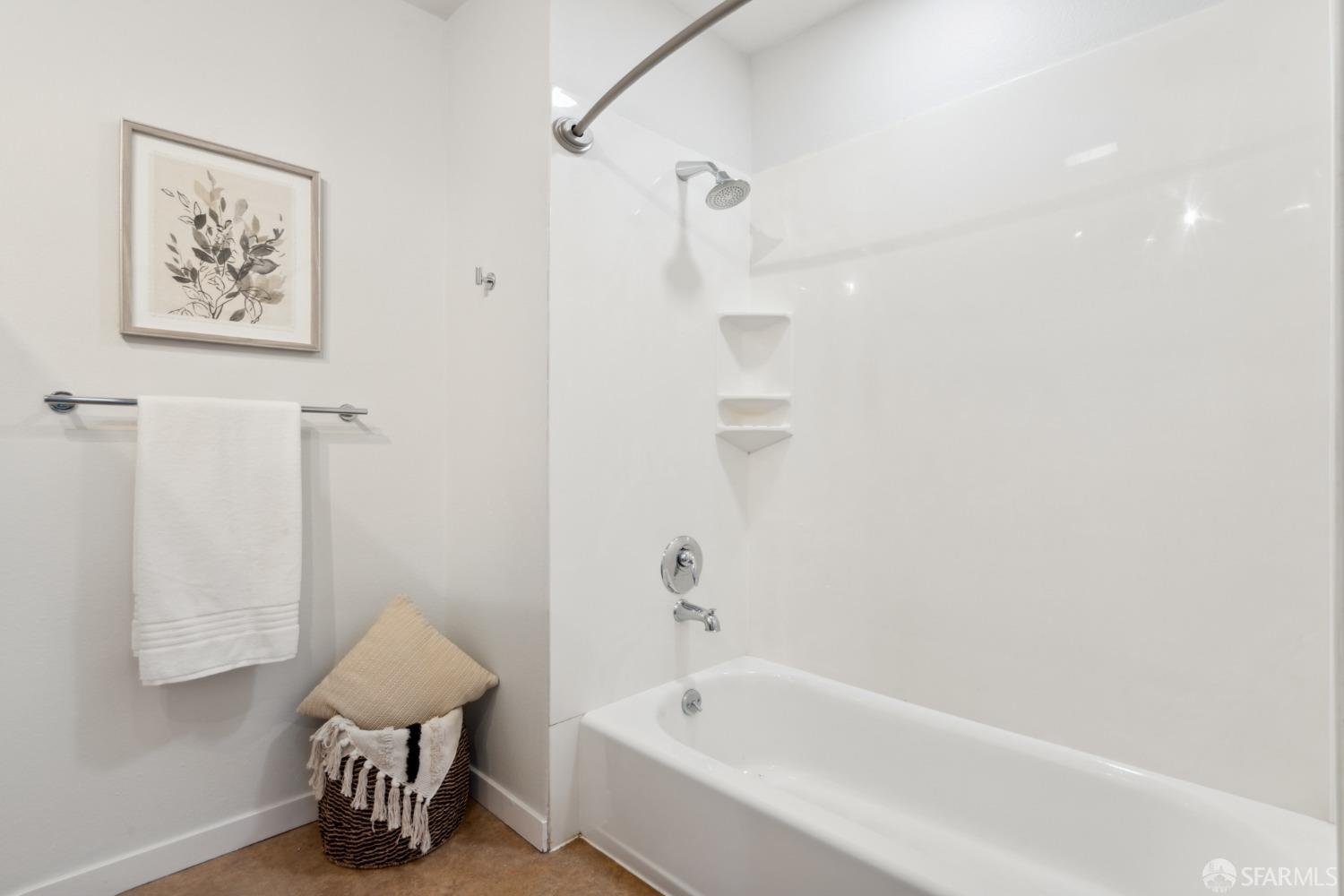 288 3rd Street, Unit 201 Oakland, CA 94607 - Photo 16 of 51 a bathroom with a bathtub and a shower
