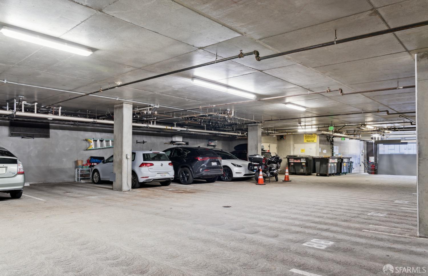 288 3rd Street, Unit 201 Oakland, CA 94607 - Photo 23 of 51 a view of parking garage with cars